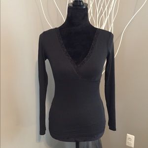 Express black cotton top with lace neckline.